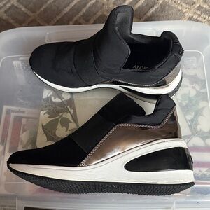 Black shoes. Slip ins. Worn in house once.